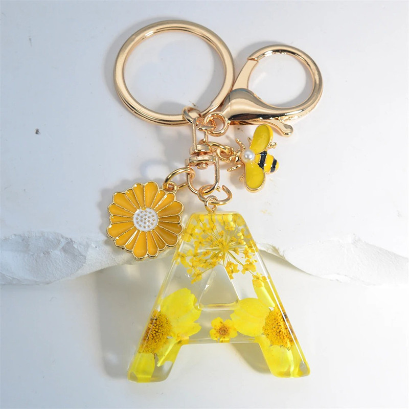 1 Set 2 pcs perle abeille porte-clés voiture clé femme sac pendentifs  (couleur aléatoire)