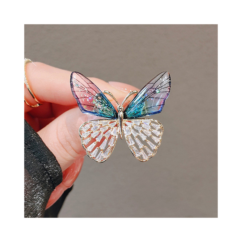 Broches Papillon aux ailles déployée en Cristal Couleur Bleu